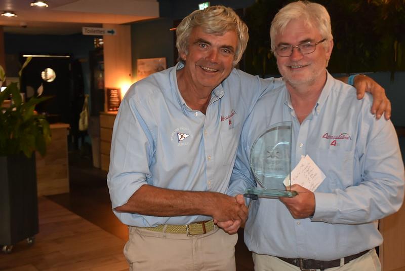 Rhys Perkins (Abracadabra) wins Class One and Overall - with Nick O'Hare, Sailing Committee Chair - 15th International Jersey to Biscay Yacht Race photo copyright Peter Funk taken at St Helier Yacht Club and featuring the IRC class