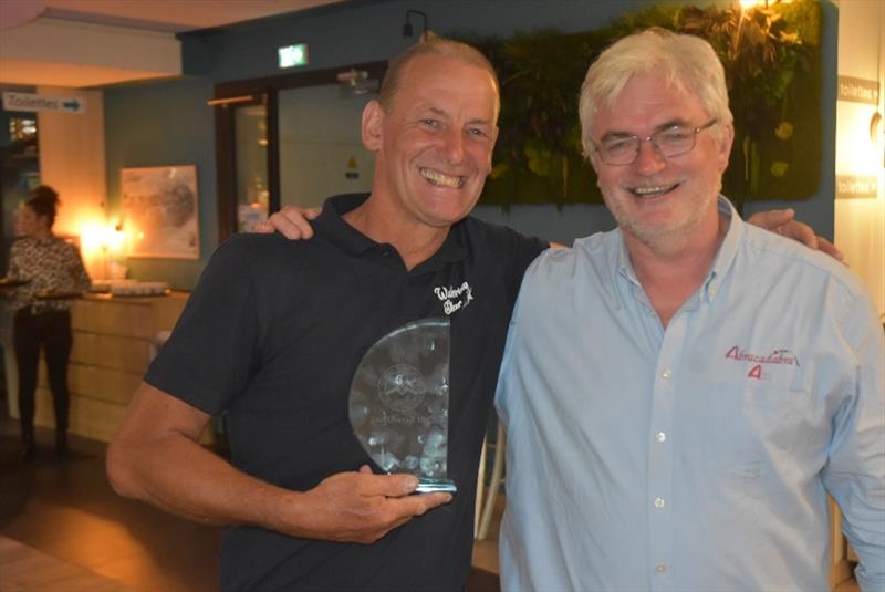 Mike Foreman (Wandering Star) wins Class Two - with Nick O'Hare, Sailing Committee Chair - 15th International Jersey to Biscay Yacht Race photo copyright Peter Funk taken at St Helier Yacht Club and featuring the IRC class