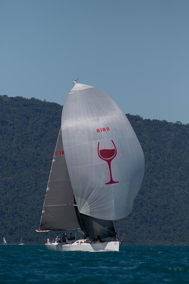 New kite for Wine Dark Sea - the glass is half full - Airlie Beach Race Week photo copyright Shirley Wodson taken at Whitsunday Sailing Club and featuring the IRC class