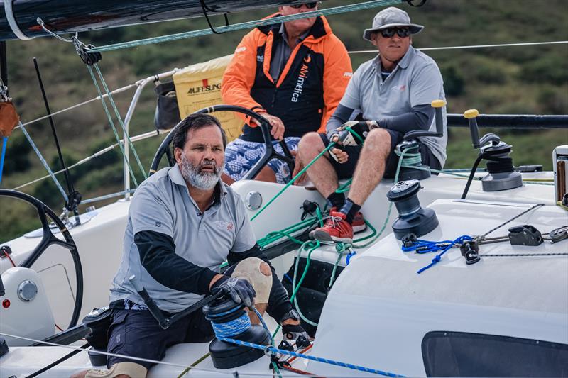 Wayne Millar and Mark Vickers (wearing the hat) on day 5 at 2022 Hamilton Island Race Week photo copyright Salty Dingo taken at Hamilton Island Yacht Club and featuring the IRC class