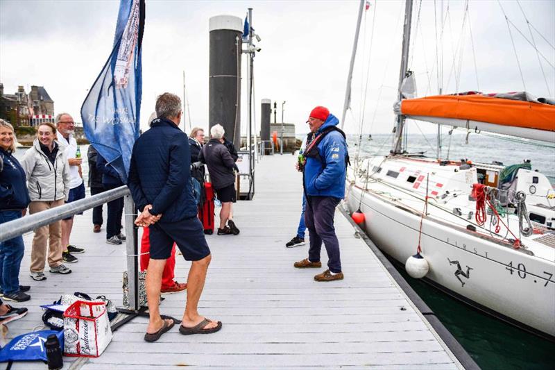 A great welcome on the dock for Kuba and Adrian photo copyright James Tomlinson / RORC taken at Royal Ocean Racing Club and featuring the IRC class