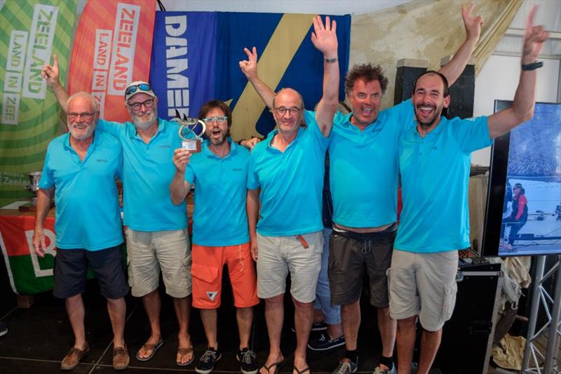 The Picsou crew pick up their well-deserved prize for IRC Three at the IRC European Championship photo copyright Ronald den Dekker - WACON Images taken at  and featuring the IRC class