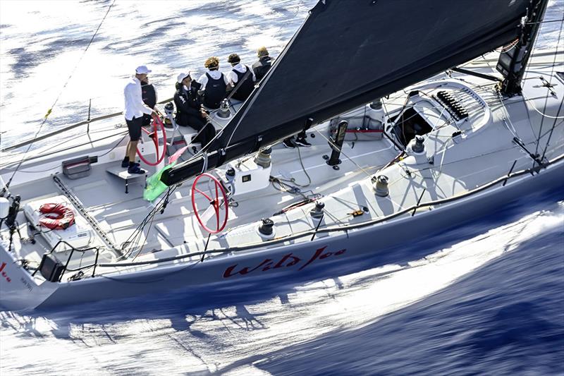 Márton Józsa at the helm of Wild Joe - there were only two moments of the race when there was any decent breeze: in the Strait of Messina and heading south to Pantelleria - Rolex Middle Sea Race - photo © Kurt Arrigo / Rolex