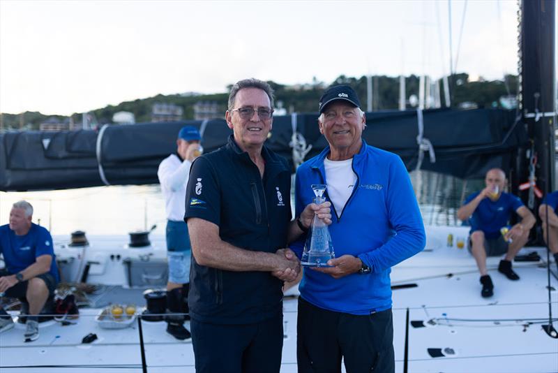 RORC CEO Jeremy Wilton presents skipper Ben Mitchell with the Monohull Line Honours trophy - RORC Caribbean 600 - photo © Arthur Daniel / RORC