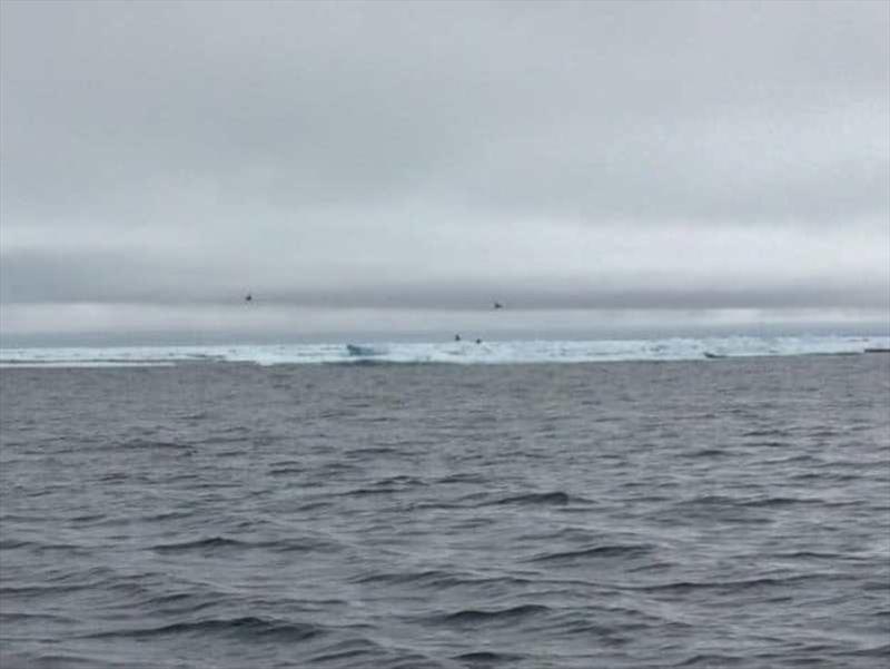 Endless ice banks noticeable from a distance by the blue tint it gives the clouds above them - photo © RWYC