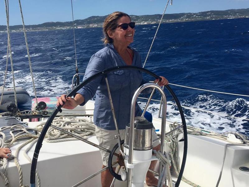 Diana Robinson takes the helm sailing off St. Croix photo copyright Sue Brown taken at Virgin Islands Sailing Association and featuring the IRC class