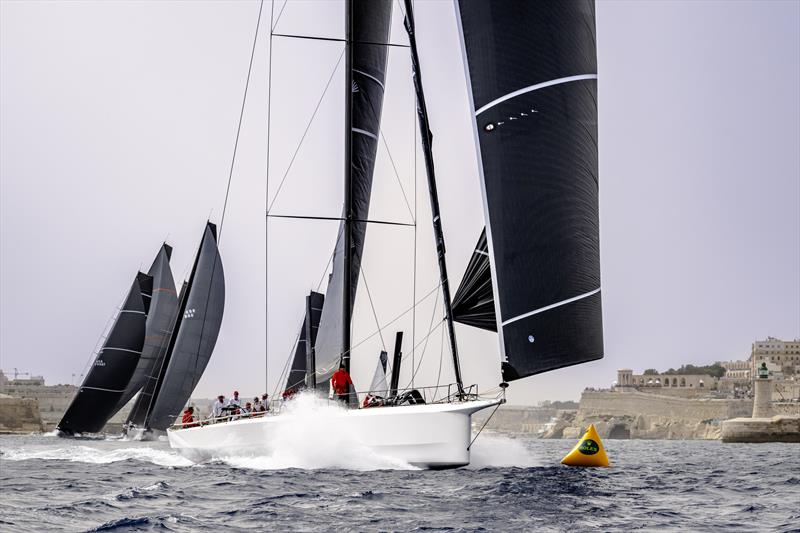 Bryon Ehrhart's Lucky (ex-Rambler 88) leads IRC One away from Malta's Grand Harbour on Saturday - Rolex Middle Sea Race photo copyright Kurt Arrigo / Rolex taken at Royal Malta Yacht Club and featuring the IRC class