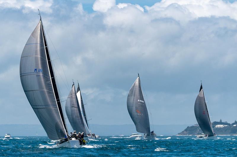 M2H fleet crossing the start line photo copyright Michael Currie taken at Ocean Racing Club of Victoria and featuring the IRC class