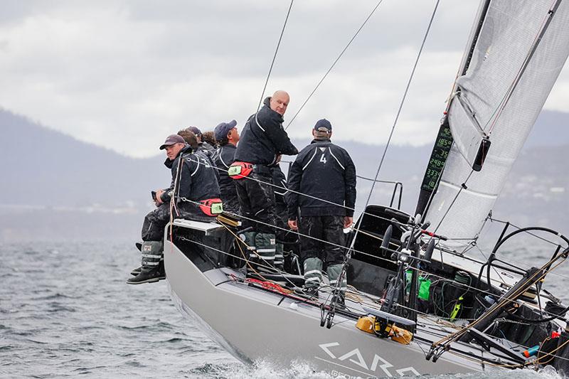 Max Klink on Caro looking back at Smuggler - 2023 Rolex Sydney Hobart Yacht Race photo copyright CYCA / Salty Dingo taken at Cruising Yacht Club of Australia and featuring the IRC class