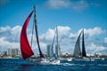 Bare boats and race boats meet up at Mullet Beach, after a downwind start in the Around the Island Race