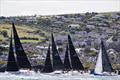 Aurelia (left) entered by Chris Power Smith competing for the Royal St. George Yacht Club leads a group of boats at the start of the SSE Renewables Round Ireland Race © David Branigan / Oceansport