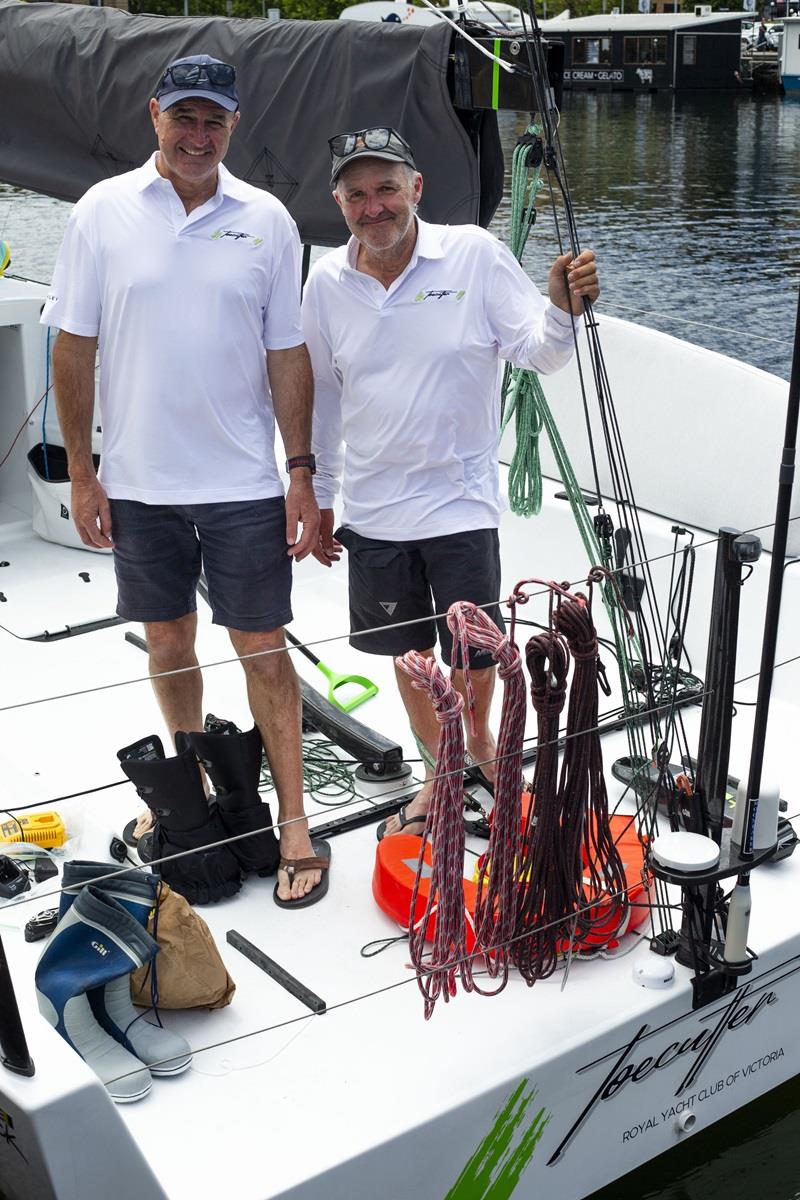 Brad Bult (left) and Robert Hick on their Toecutter in Hobart - 2023 Rolex Sydney Hobart Yacht Race - photo © CYCA / Ashley Dart