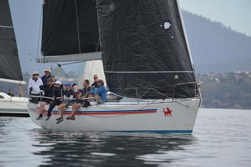 Hobart Combined Clubs Long Race Series Race 5: Intrigue's crew gets low to leeward to keep the boat moving in light winds photo copyright Colleen Darcey taken at Derwent Sailing Squadron and featuring the IRC class