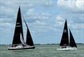 Stiletto launching her kite behind Flying Pig = Summer Series at Royal Temple YC race 1