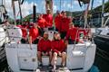 Tony Muller (far right sitting) and his Brava crew - SeaLink Magnetic Island Race Week © Revolution Production