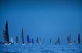 RORC Fleet at twylight - 2025 RORC Cowes Offshore Racing Series  © Paul Wyeth / RORC