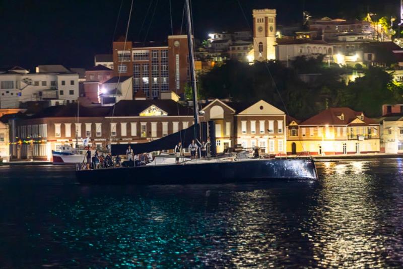 VO65 Sisi makes her way along the Carenage in St George's before a jubilant dockside welcome at Port Louis Marina Grenada - photo © Arthur Daniel / RORC