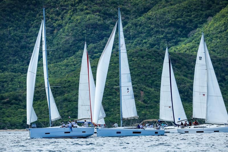 Bareboat fleet heading down wind toward the West coast of the island - Antigua Sailing Week - photo © Paul Wyeth
