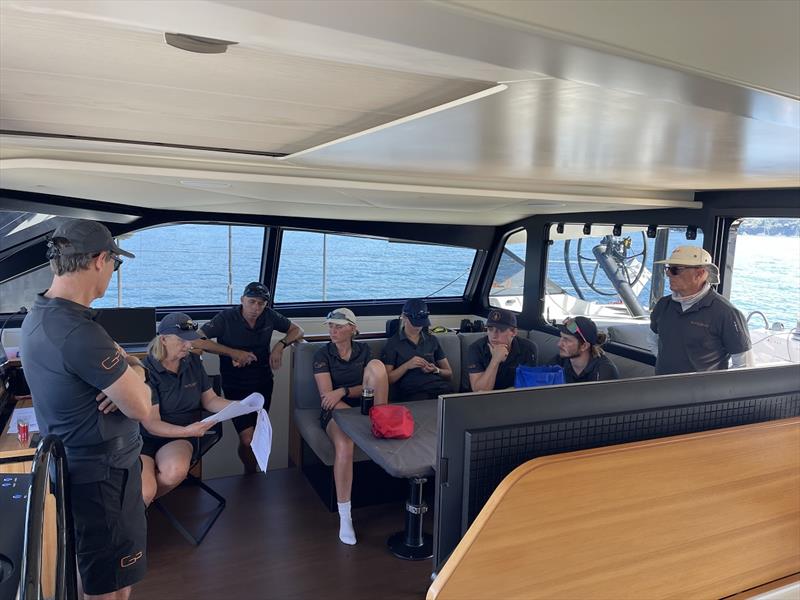 Slingshot crew briefing - Adrienne Cahalan holds the cards - Pittwater to Coffs Harbour Yacht Race - photo © Alex Dara Johnston