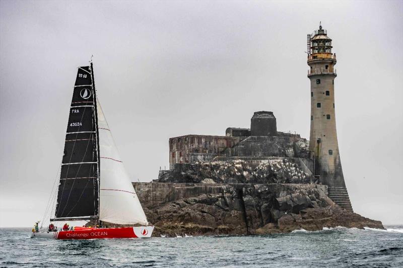 VO60 Challenge Ocean (Libertalia) rounds the Fastnet Rock in the 2021 race - photo © Rolex / Kurt Arrigo