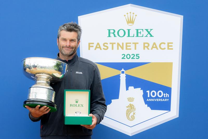 Léon's skipper Alexis Loison receives the Fastnet Challenge Cup as winner of IRC overall in the 2025 Rolex Fastnet Race photo copyright ROLEX / Carlo Borlenghi taken at Royal Ocean Racing Club and featuring the IRC class