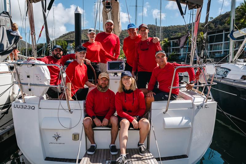 Tony Muller (far right sitting) and his Brava crew - SeaLink Magnetic Island Race Week photo copyright Revolution Production taken at Townsville Yacht Club and featuring the IRC class