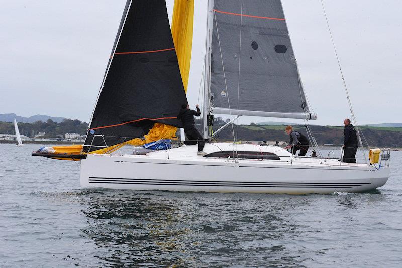 Nigel and sons on Darling, hoisting round the mark to lead the fleet downwind - Pwllheli Autumn challenge series photo copyright Gerallt Williams taken at Pwllheli Sailing Club and featuring the IRC class