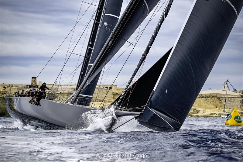 Remon Vos' Black Jack 100 finishes the 46th Rolex Middle Sea Race at 05:44:07 CEST on Tuesday photo copyright Kurt Arrigo / Rolex taken at Royal Malta Yacht Club and featuring the IRC class