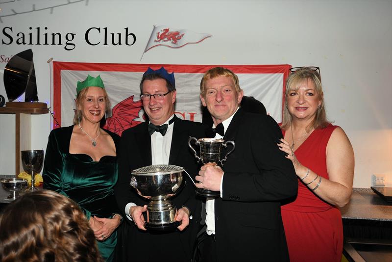 Peter Dunlop and Ian ‘Sammo' Jones collecting Mojito's trophies from Vice Commodore Victoria Cox and Commodore Lyndsay Harrold - Pwllheli SC Christmas Prize-giving photo copyright Gerallt Williams taken at Pwllheli Sailing Club and featuring the IRC class