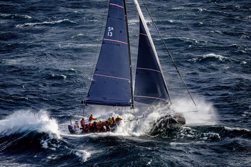 Scarlet Runner (AUS) - Rounding Tasman Island - Rolex Sydney Hobart Race - December 29, 2025 photo copyright Kurt Arrigo taken at Cruising Yacht Club of Australia and featuring the IRC class