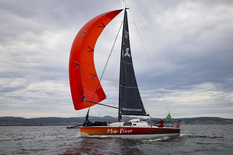 Min River (AUS) - Jiang Lin and Alexis Loison with protest flag flying - Rolex Sydney Hobart Race - December 30, 2025 photo copyright Salty Dingo taken at Cruising Yacht Club of Australia and featuring the IRC class