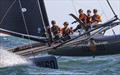 Larry Phillips' (Newport, R.I.) M32 Midtown Racing swept the Multihull Class and won the Incognito Trophy at Edgartown Race Weekend's ‘Round-the-Island Race &copy; Stephen R Cloutier