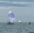 Mojito Bach heading for the Jac y Do mark followed by Sgrech Bach in the Pwllheli Sailing Club Summer Series &copy;  John Dunlop