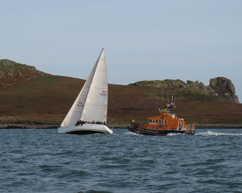 Pretty Polly and the RNLI during the New Year's Day racing at Howth Yacht Club photo copyright Neil Murphy taken at Howth Yacht Club and featuring the IRC class