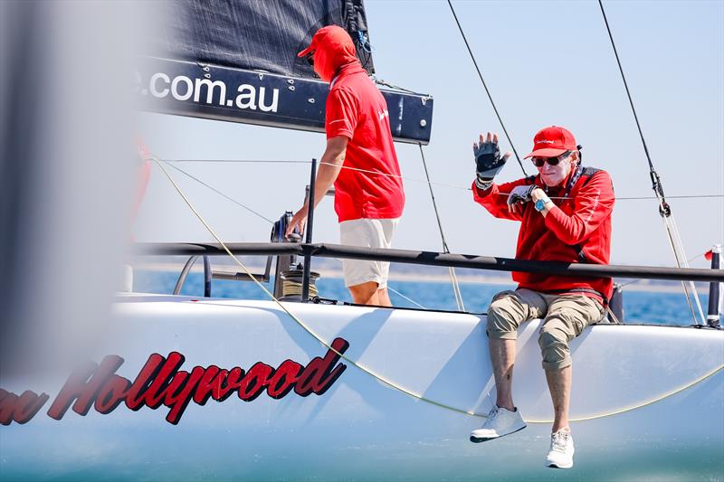 Ray Roberts waves from onboard with Hollywood during the Holiday Inn & Suites Geelong Passage Race at the Festival of Sails 2026 - photo © Salty Dingo