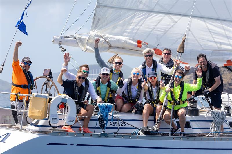 Eira crew celebrate - RORC Caribbean 600 2025 - finish line day 5 - photo © Tim Wright / Photoaction.com