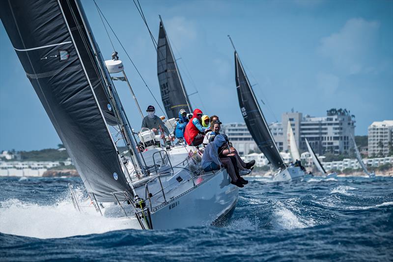46th St. Maarten Heineken Regatta Day 4 - Teams raced a mix of windward-leeward and coastal courses, with fleets crossing paths and converging to create spectacular sights all along the island's coastline - photo © Laurens Morel