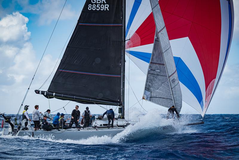 46th St. Maarten Heineken Regatta Day 4 - Jackknife crosses the finish line in their first race of the day, delivering a standout performance that ultimately secured them the overall class victory - photo © Laurens Morel