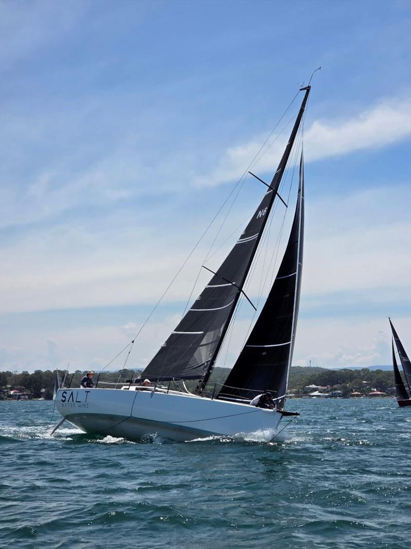 Saltwater Wine romping in a bit of breeze - Pittwater to Coffs Harbour Yacht Race photo copyright Tom Woods taken at Royal Prince Alfred Yacht Club and featuring the IRC class