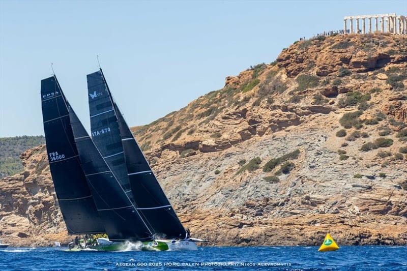 DAGUET 5 locked in battle at the first turning mark of last year's race, with spectators looking on  from the cliff overhead at the Ancient Temple of Poseidon - photo © Nikos Alevromytis / Alen Photography