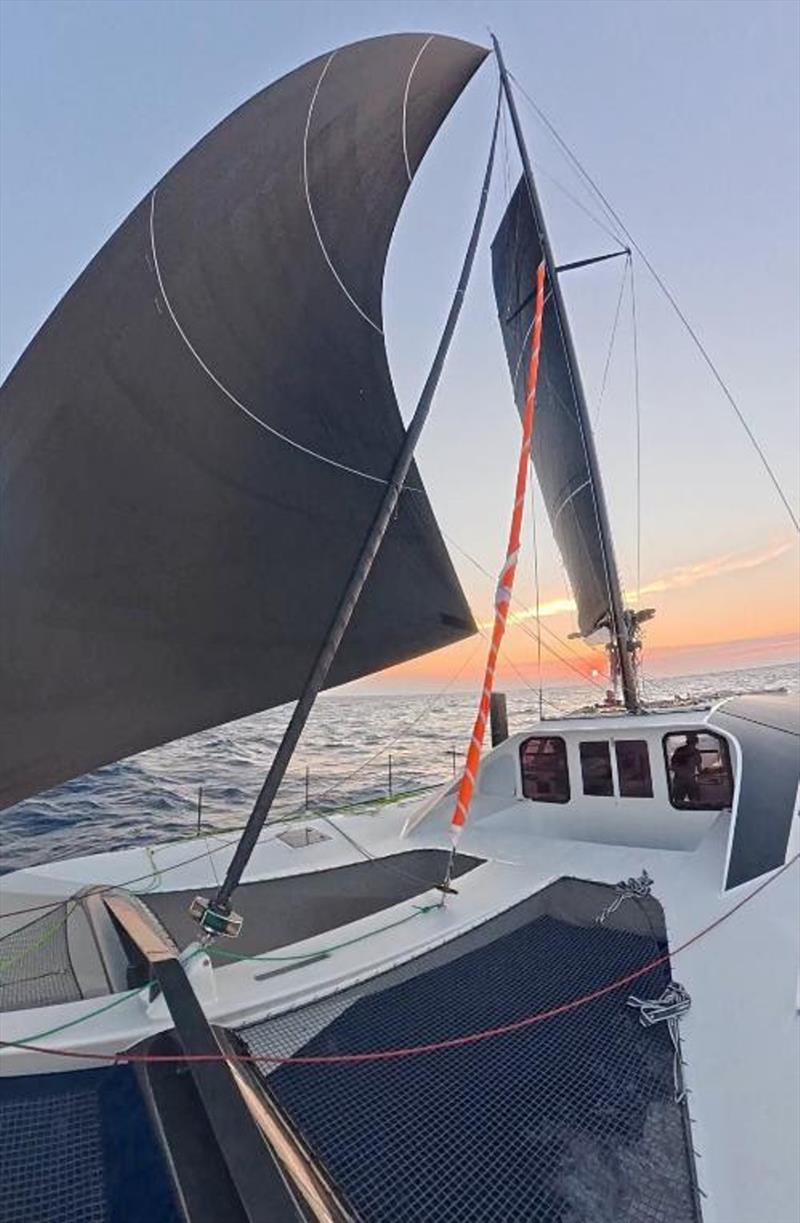 For teams still on the course conditions changed in the last 24 hours from enjoying beautiful sailing at sunset to asking becalmed neighbors if they had some food and air conditioning to share photo copyright Nikos Alevromytis / Alen Photography taken at Hellenic Offshore Racing Club and featuring the IRC class