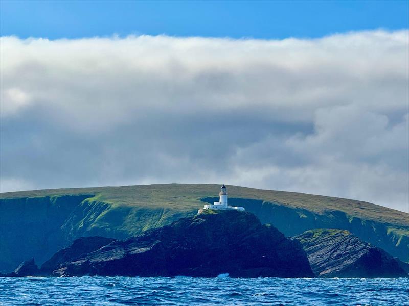 Superb photo of the most northerly lighthouse in the UK - RORC Round Britain and Ireland Race 2026 - Day 9 photo copyright Ronin taken at Royal Ocean Racing Club and featuring the IRC class