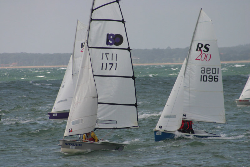 Action from Cowes Dinghy Week photo copyright Brian Augustus / www.sailingimages.co.uk taken at Gurnard Sailing Club and featuring the ISO class