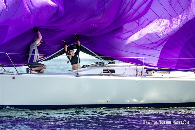 The foredeck crew aboard Bill Zartler's Deja Voodoo executes a perfect takedown on their way to winning the second J/105 race of the day at the 2019 Helly Hansen NOOD Regatta at Marblehead Race Week photo copyright Paul Todd / www.outsideimages.com taken at Boston Yacht Club and featuring the J105 class