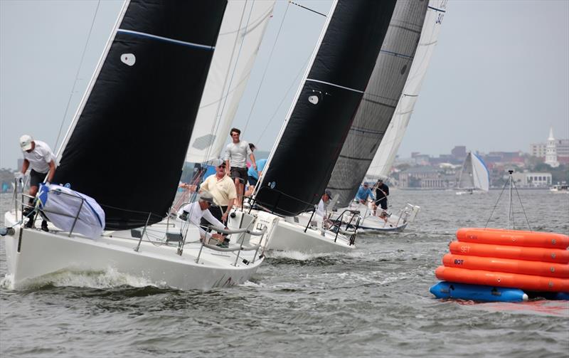 A group of J/105 one-designs get set to round the windward during a race on Friday - Charleston Race Week 2021 photo copyright Willy Keyworth taken at Charleston Yacht Club and featuring the J105 class