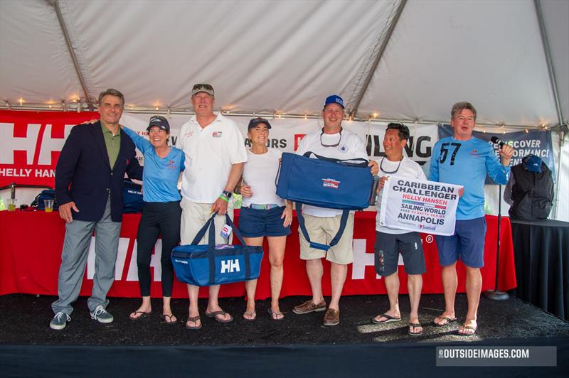 The crew of Cedric Lewis and Fredrik Salvesen's J/105 Mirage celebrate their selection as the 2022 Helly Hansen Sailing World Regatta Series Annapolis Overall Winner photo copyright Paul Todd / Outsideimages.com taken at Annapolis Yacht Club and featuring the J105 class