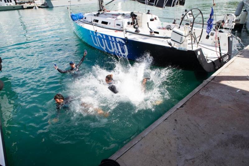 The young team on Pamala Baldwin's J/122 Liquid celebrate completing the race in Antigua photo copyright RORC / Arthur Daniel taken at Royal Ocean Racing Club and featuring the J/122 class