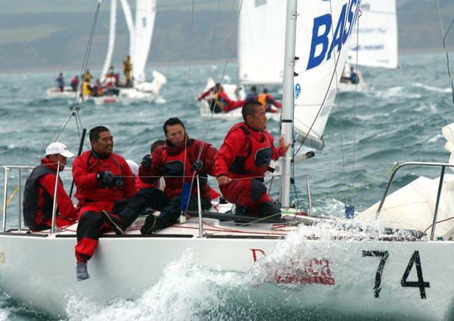 Windy Thursday during the Basilica J/24 World Championships at Weymouth photo copyright Steve Bell / www.fotoboat.com taken at Weymouth & Portland Sailing Academy and featuring the J/24 class