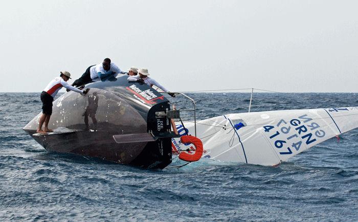 Strong gusts cause problems on day 2 of the Mount Gay Round Barbados Race Series photo copyright Sue Pelling taken at Barbados Cruising Club and featuring the J/24 class