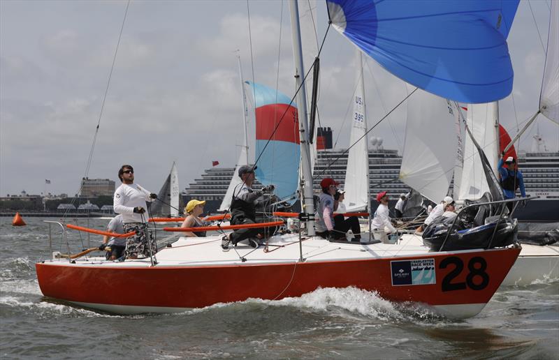 Tyler Benjamin's J/24 Orange Crush surfs down a wave at Sperry Charleston Race Week 2017 photo copyright Charleston Race Week / Tim Wilkes taken at Charleston Yacht Club and featuring the J/24 class